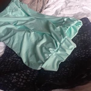 Brand new flowy tube top in mint.